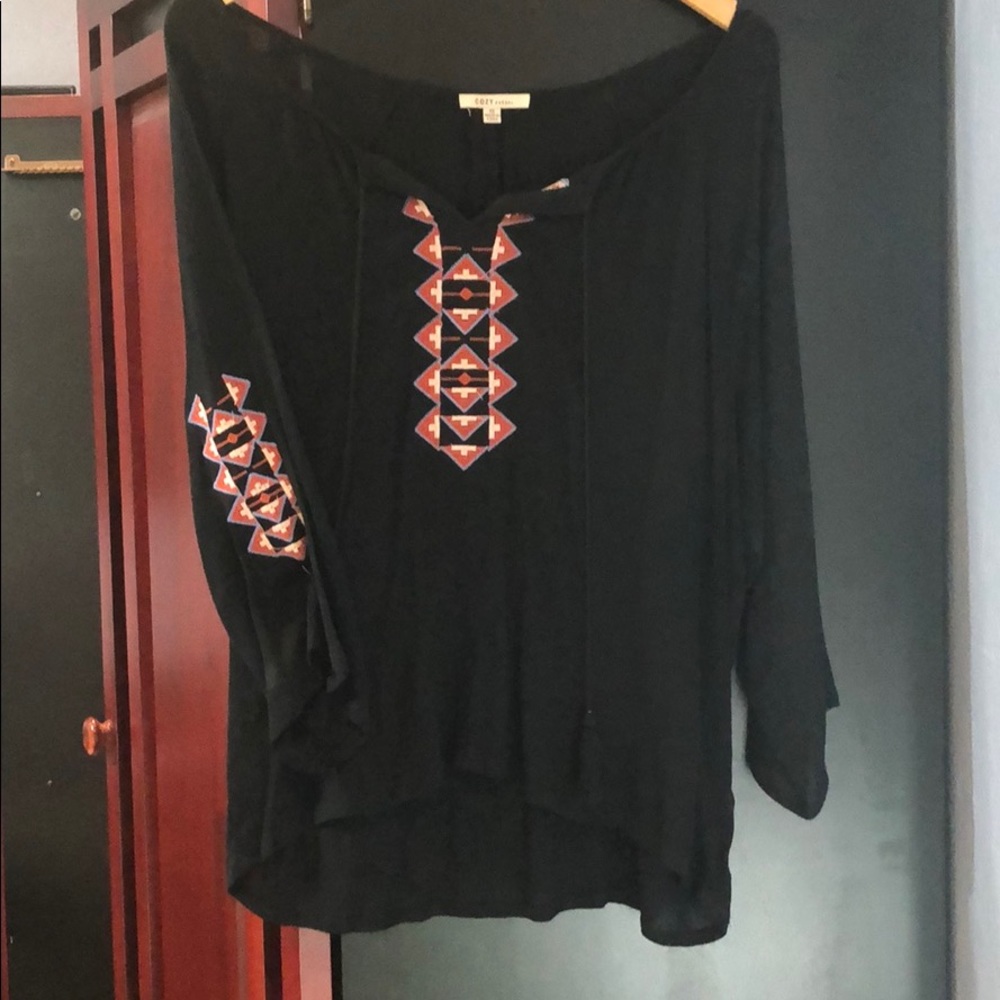 Loose, pheasant type, black blouse, never worn.